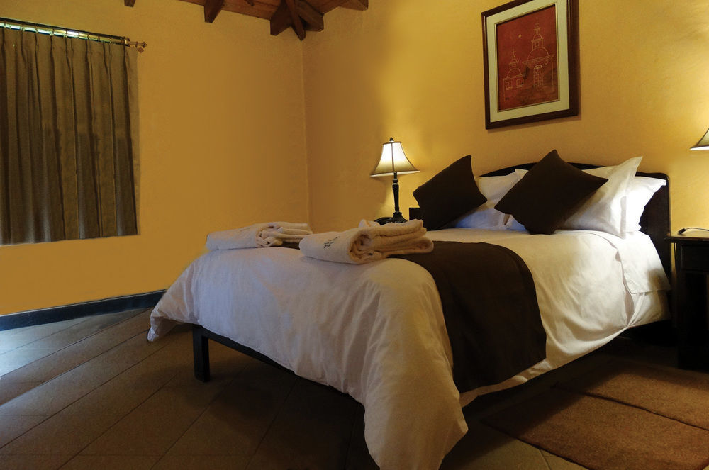 Termas De Papallacta Exterior foto A bedroom at the hotel